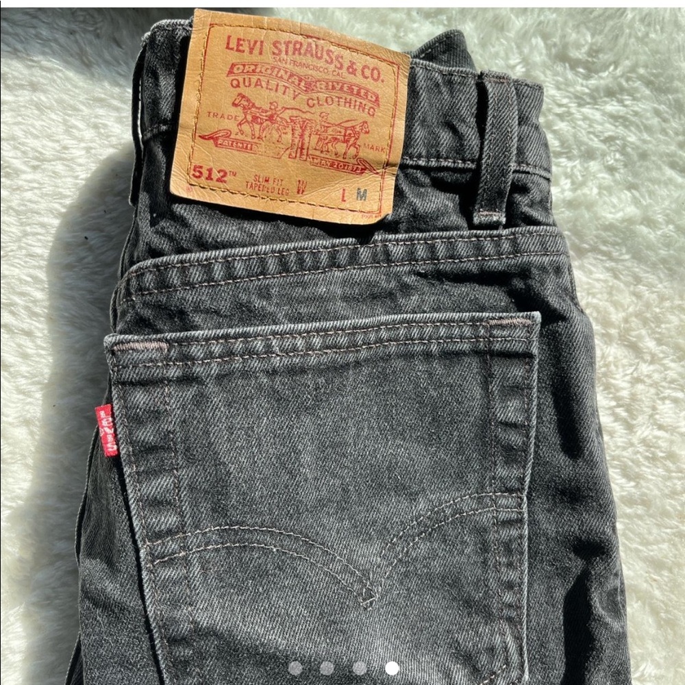 Vintage black distressed Levi’s shorts